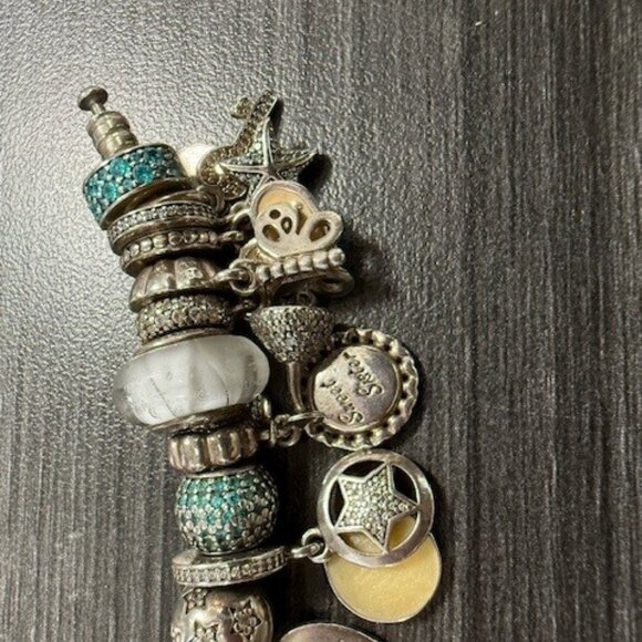 Authentic S925 Pandora Bracelet with 30 charms in excellent Preloved condition - Picture 7 of 9